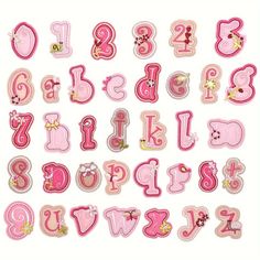 the letters and numbers are made out of pink felt with sequins on them