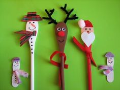 three different types of christmas decorations on a green wall with snowmen, santa clause and reindeer