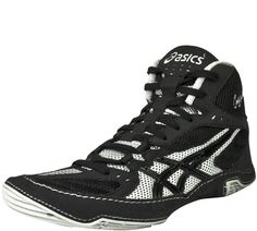 a black and white shoe with the word asics on it