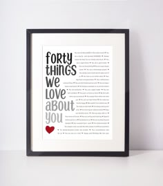 a framed print with the words forty things we love about you in black and red