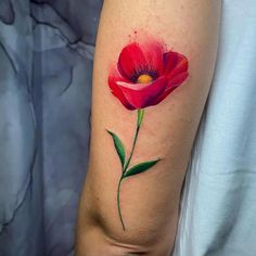 a red flower with green leaves is on the left arm and it's watercolor style