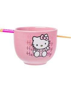 a pink hello kitty cup with a yellow straw sticking out of it's side