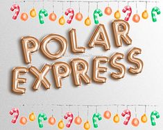 the word polar express spelled with balloons and streamers on a white background that says,'polar express '