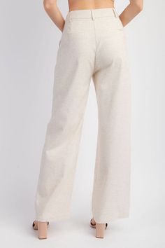 These Oatmeal Linen Trousers are a versatile addition to any wardrobe. Made from high-quality linen, they provide a comfortable and breathable fit. With their classic oatmeal color, they can easily be dressed up or down for any occasion. Perfect for a stylish and comfortable look. Fabric & fit: 67% viscose, 30% linen, 3% spandex Model is wearing size Small.