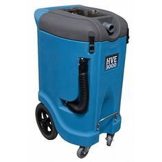 a blue and gray vacuum is on wheels