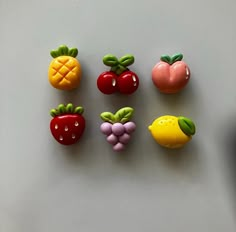 small fruits and vegetables are arranged on a table