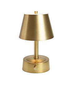 a gold table lamp on a white background with a dimmer in the middle and a small light bulb at the base