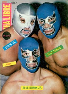 three men with wrestling masks on their faces