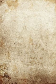 an old grungy textured paper background with space for text or image