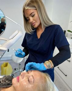 a woman getting her hair cut at the salon