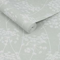 an image of a wallpaper with flowers and leaves in grey colors on the background