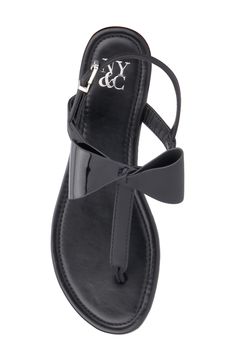 A slim-soled slide sandal is secured with an ankle strap and features a mixed metallic bow to ensure eye-catching appeal. Adjustable strap with buckle closure
 Synthetic upper and lining, rubber sole Imported New York And Company, Sandal Women, Thong Sandals, Things To Buy, Slide Sandals, Nordstrom Rack, Ankle Strap, Rubber Sole, Womens Sandals