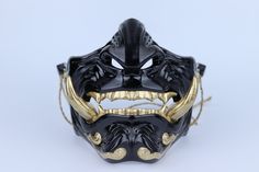 "There are necessary holes for you to attach a straw rope. We will also send some straw rope next to the mask so that you can tie the mask to your face. The masks we produce are comfortable and practical to use. ** Dimensions: -SMALL 12-13 cm / 4.7-5.1 inch -MEDIUM 13-14 cm / 5.1 -5.5 inch -LARGE 14-15cm / 5.5-5.9 inch -XLARGE 15-16cm / 5.9-6.3 inch *Easy Measurement! Measurement Guide: 1- Take the string (it can be any string) and measure from the left or right side of your face as SHOWN in the Owni Mask, Japanese Oni Mask, Oni Samurai, Ronin Samurai, Oni Demon, Japanese Oni, Japanese Mask, Oni Mask, Japanese Folklore