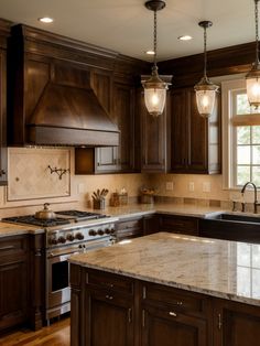 a large kitchen with wooden cabinets and marble counter tops, an island in the middle