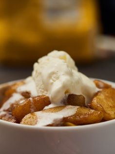 a white bowl filled with food and ice cream