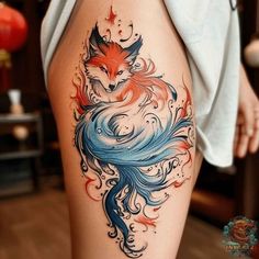 a woman's thigh with a fox tattoo on it