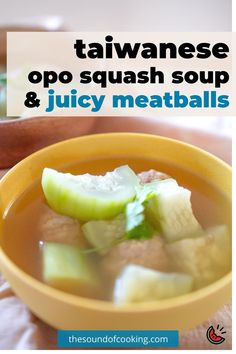 a yellow bowl filled with soup on top of a table