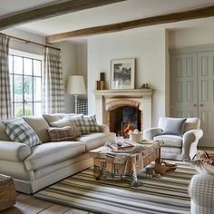 Modern cottage living room, classic look with striped and checked patterns on cushions, rugs, and upholstery, in a harmonious color palette3 Cozy Cottage Paint Color Behr, Cozy Cottage Living Room, Cottage Decor Living Room