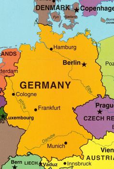 a map of germany with all the major cities and towns in yellow, red, green, blue