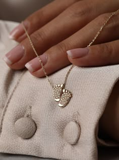 "Get Extra 5% off when you put your item in their cart! CODE: \"MOTHERDAYDEALS\" Solid gold baby foot necklace/Baby feet pendant Mom Necklace Gift/ Gold Baby Footprints/ Mom and Baby jewelry/ First time mom gift/ Mom gift This adorable mother-Baby necklace is the perfect gift for a new mom. ♥Let a new mom's pride shine with a mother-child necklace. Stunning, unique mother-baby necklace designs. Features * Made to Order *Gold KT: 14K Solid Gold *Gold Color: Available in Yellow, Rose or White Gold Jewelry For New Mom, Baby Jewelry Gold Newborn, Baby Necklace Gold, Baby Gift Ideas Unique, Moms Necklace, Silver Baby Gifts, Gold Pendant Designs, Gifts For Mom To Be, Mom To Be Gifts