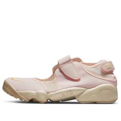 Embrace the summer breeze with the Nike Air Rift Breathe. Its lightweight, breathable mesh keeps your feet cool and comfortable, while the hook-and-loop strap allows for easy on and off. The iconic split-toe design, paired with Air cushioning and a comfortable foam midsole, provides long-lasting comfort for all-day wear. (Women's) Carrie Bradshaw Shoes, Pink Ninja, Nike Air Rift, Shoes Everyday, Future Board, Pink Gym, Tabi Shoes, Clothing Pieces, Ballet Slippers