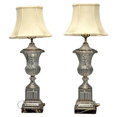 two lamps are sitting next to each other