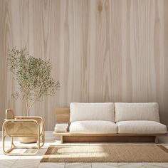 a white couch sitting next to a wooden table