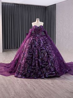 Blissfully elegant, this purple ball gown is designed to make you the star of any formal occasion. The sweetheart neckline offers a classic and romantic appeal, beautifully framing your shoulders and collarbones. The bodice is intricately embellished with shimmering sequins, adding a touch of glamour and sophistication. The off-shoulder tulle sleeves enhance the dreamy and ethereal feel of the gown. The full, flowing skirt is made from layers of soft fabric, creating a voluminous and graceful silhouette that moves beautifully with every step. Ideal for proms, galas, or any special event, this dress ensures you will leave a lasting impression. Pair it with sparkling accessories and your favorite heels to complete a look that exudes confidence and charm. This gown is a perfect blend of class Sequin Lace Wedding Dress, Purple Ball Gown, Confirmation Dresses, Strapless Prom Dress, Quince Dress, Purple Party, Formal Wear Dresses, Fairytale Dress, فستان سهرة