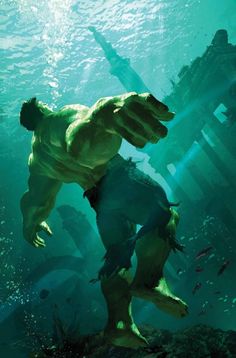 an image of a man in the water next to a giant hulk statue with his hands on his hips