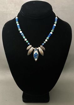 "Stunning 925 Sterling Silver Chain decorated with Multi Gemstones beads on Chain and leaf shape pendant Necklace with extended Chain. The gemstones come with Lapis Lazuli, Turquoise and pearl, make the necklace so beautiful and special. Good pre-own condition.   The whole necklace length 16\" (41 cm);  Extended chain: 4\" (10 cm) The middle leaf length: 1 3/8\" (3.5 cm) Weight:  26 grams (0.8 Troy Ozs) Please read description and see pictures carefully. We have no return and exchange policy. We T As In Troy Necklace, T For Troy Necklace, Hammered Cuff Bracelet, Claw Necklace, 925 Sterling Silver Chain, Hammered Silver, Leaf Pendant, Sterling Silver Chains, Silver Necklaces