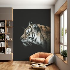 a room with a tiger wall mural on the wall and a chair in front of it