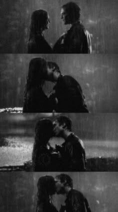 two people are kissing in the rain