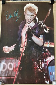 an autographed photo of the singer billy idol