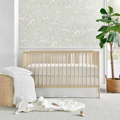 The Cloud Muslin Nursery Collection is inspired by minimalistic luxurious elegance. The 5 Piece Crib Bedding Set includes a Quilt, Fitted Sheet, Two Swaddles & Bear Lovey. The quilt features soft textured muslin with stitched white stars, with a fitted sheet matching with the design of the quilt. Adding minimalist luxury accents, this design will transform your child's room! White Crib Bedding, Baby Room Closet, Baby Crib Bedding Sets, White Crib, Jones Family, Nursery Room Design, Baby Crib Bedding, Nursery Room Inspiration, Dust Ruffle