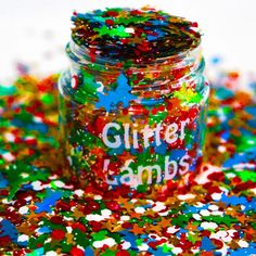 a jar filled with lots of colorful confetti