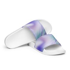 Keep up with the latest trends with these chic BeSculpt Slides! Crafted from quality materials, these slides feature vibrant, abstract art to add color and style to any look. Step out in confidence with these fashionable slides! This pair of Blue Haze BeSculpt Abstract Art Women's Slides gives you comfort and style while walking anywhere, whether it's at the airport, around the block, to the beach, or to the pool. A pair of these will keep you comfy throughout your day thanks to the cushioned up Multicolor Slip-on Slides For Summer, Purple Synthetic Slides For Summer, Purple Slide Sandals For Summer, Trendy Slip-on Slides For Spring, Multicolor Synthetic Slides For Summer, Multicolor Slides For Vacation, Trendy Multicolor Slide Sandals, Purple Synthetic Slides For Spring, Blue Slide Slippers For Spring