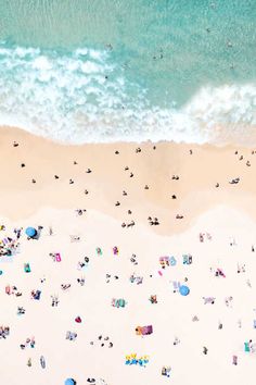 an aerial view of people at the beach