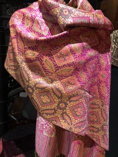 Bright magenta pink and metallic gold brocade weave. Vintage styled wrap 28 X 70 Nice brocade paisley Very soft silk blend Styled from ancient Jamawar Indian motifs These are replicated from vintage shawl collections by my own company We may have larger quantities available for weddings, bridesmaids, or wholesale orders. Please inquire. All shipped free in the US Please check out our THOUSANDS of great reviews Pink Silk Pashmina Shawl, Pink Wedding Pashmina Shawl Traditional Drape, Pink Bollywood Silk Shawl, Pink Silk Bollywood Shawl, Traditional Gold Pashmina Scarf, Silk Scarves With Traditional Patterns And Drape, Silk Scarves With Traditional Patterns, Pink Shawl With Pallu In Traditional Drape, Traditional Gold Silk Scarf