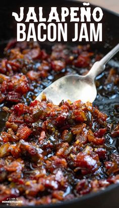 bacon jam in a skillet with a spoon on the side and text overlay that reads jalapeno bacon jam