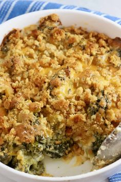 a casserole dish with broccoli and bread crumbs