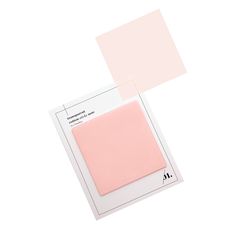 a pink square is shown on top of a white sheet