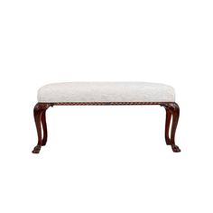 a wooden bench with a white upholstered cushion on the top and bottom end