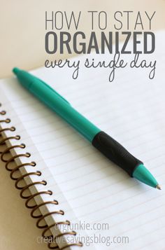 a pen sitting on top of a notebook with the words how to stay organized every single day