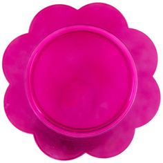 a pink plastic plate with a flower design on the top and bottom, sitting in front of a white background