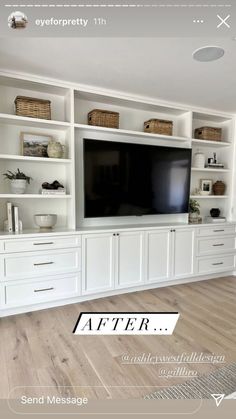 a white entertainment center with built - in cabinets and a flat screen tv