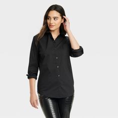 Elevate your shirt collection with this Slim-Fit Boyfriend Tailored Long-Sleeve Button-Down Shirt from A New Day™. This lightweight poplin shirt is made of a cotton blend with spandex for comfortable wear that moves and stretches with you. It features a collared neck, a full-length button-down front, a chest patch pocket, long sleeves with buttoned cuffs and a back yoke for a polished appearance. The tailored boyfriend shirt offers a flattering slim fit with a tuckable, curved hem, perfect for b Black Button Up Shirt Outfit, Black Button Up Shirt, Closet Wishlist, Black Button Down Shirt, Black Jeans Outfit, Character Aesthetics, Boyfriend Shirt, Shirt Collection, Tunic Length