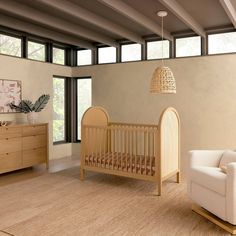 a baby crib in the middle of a living room