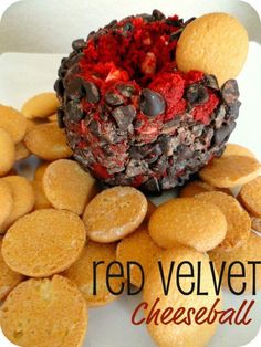 red velvet cheeseball with chocolate chips and cookies on the bottom, in front of it