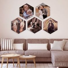 a living room filled with furniture and pictures hanging on the wall above it's coffee table