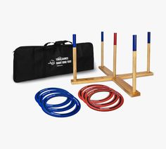 a set of four jump sticks and two jump rings in front of a black bag